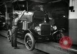 Image of Body assembly of Model T Fifteen Millionth car Highland Park Michigan USA, 1927, second 21 stock footage video 65675031966