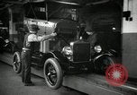 Image of Body assembly of Model T Fifteen Millionth car Highland Park Michigan USA, 1927, second 22 stock footage video 65675031966