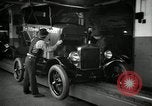 Image of Body assembly of Model T Fifteen Millionth car Highland Park Michigan USA, 1927, second 23 stock footage video 65675031966