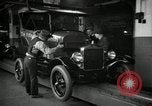 Image of Body assembly of Model T Fifteen Millionth car Highland Park Michigan USA, 1927, second 27 stock footage video 65675031966