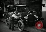Image of Body assembly of Model T Fifteen Millionth car Highland Park Michigan USA, 1927, second 33 stock footage video 65675031966