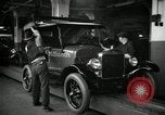 Image of Body assembly of Model T Fifteen Millionth car Highland Park Michigan USA, 1927, second 35 stock footage video 65675031966