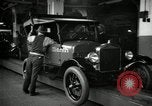 Image of Body assembly of Model T Fifteen Millionth car Highland Park Michigan USA, 1927, second 42 stock footage video 65675031966