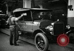 Image of Body assembly of Model T Fifteen Millionth car Highland Park Michigan USA, 1927, second 53 stock footage video 65675031966