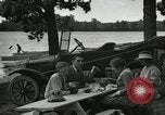 Image of family picnics United States USA, 1922, second 54 stock footage video 65675031972