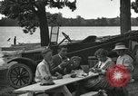 Image of family picnics United States USA, 1922, second 56 stock footage video 65675031972