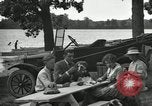 Image of family picnics United States USA, 1922, second 57 stock footage video 65675031972