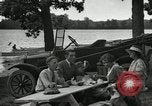 Image of family picnics United States USA, 1922, second 62 stock footage video 65675031972