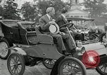 Standbild Henry Ford und Sohn Edsel Ford pose in frühen Modell Autos Dearborn Michigan USA, 1933, aus Sekunde 25 historischem Filmmaterial Videoclip 65675032016