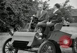 Standbild Henry Ford und Sohn Edsel Ford pose in frühen Modell Autos Dearborn Michigan USA, 1933, aus Sekunde 32 historischem Filmmaterial Videoclip 65675032016