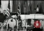 Image of Count Basie and Orchestra at Paul Robeson birthday party New York City USA, 1944, second 1 stock footage video 65675032041