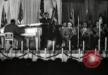 Image of Count Basie and Orchestra at Paul Robeson birthday party New York City USA, 1944, second 15 stock footage video 65675032041