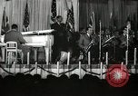 Image of Count Basie and Orchestra at Paul Robeson birthday party New York City USA, 1944, second 16 stock footage video 65675032041