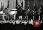 Image of Count Basie and Orchestra at Paul Robeson birthday party New York City USA, 1944, second 18 stock footage video 65675032041