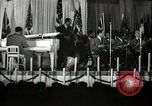 Image of Count Basie and Orchestra at Paul Robeson birthday party New York City USA, 1944, second 20 stock footage video 65675032041