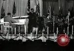 Image of Count Basie and Orchestra at Paul Robeson birthday party New York City USA, 1944, second 23 stock footage video 65675032041