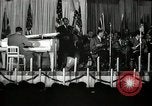 Image of Count Basie and Orchestra at Paul Robeson birthday party New York City USA, 1944, second 24 stock footage video 65675032041