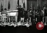 Image of Count Basie and Orchestra at Paul Robeson birthday party New York City USA, 1944, second 33 stock footage video 65675032041