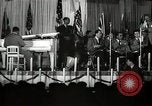 Image of Count Basie and Orchestra at Paul Robeson birthday party New York City USA, 1944, second 50 stock footage video 65675032041