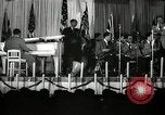 Image of Count Basie and Orchestra at Paul Robeson birthday party New York City USA, 1944, second 56 stock footage video 65675032041