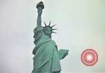 Image of Statue of Liberty wide and closeup views New York City USA, 1976, second 32 stock footage video 65675032062