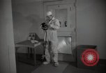 Image of Man handles radioactive materials Richland Washington USA, 1947, second 3 stock footage video 65675032069