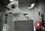 Image of Man handles radioactive materials Richland Washington USA, 1947, second 28 stock footage video 65675032069