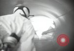 Image of Protective equipment against radiation exposure Richland Washington USA, 1947, second 57 stock footage video 65675032070