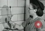 Image of women workers United States USA, 1942, second 16 stock footage video 65675032088