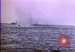 Image of American enters WW 1. Germans torpedo ships. Armistice. Treaty of Vers Europe, 1919, second 6 stock footage video 65675032133