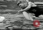 Image of marathon swim New York City USA, 1930, second 48 stock footage video 65675032155
