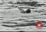 Image of marathon swim New York City USA, 1930, second 59 stock footage video 65675032155