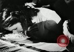 Image of spaghetti eating competition United States USA, 1950, second 4 stock footage video 65675032172