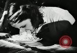 Image of spaghetti eating competition United States USA, 1950, second 5 stock footage video 65675032172