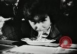 Image of spaghetti eating competition United States USA, 1950, second 7 stock footage video 65675032172