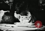 Image of spaghetti eating competition United States USA, 1950, second 10 stock footage video 65675032172