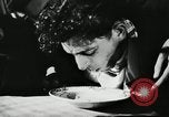 Image of spaghetti eating competition United States USA, 1950, second 11 stock footage video 65675032172