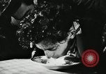 Image of spaghetti eating competition United States USA, 1950, second 12 stock footage video 65675032172