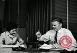 Image of sexual harassment in the workplace United States USA, 1950, second 25 stock footage video 65675032176