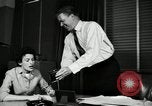 Image of sexual harassment in the workplace United States USA, 1950, second 28 stock footage video 65675032176