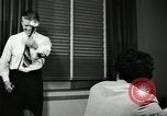 Image of sexual harassment in the workplace United States USA, 1950, second 34 stock footage video 65675032176