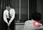 Image of sexual harassment in the workplace United States USA, 1950, second 35 stock footage video 65675032176