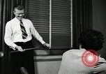 Image of sexual harassment in the workplace United States USA, 1950, second 36 stock footage video 65675032176