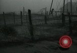 Image of debris in fence during dust bowl Dalhart Texas USA, 1937, second 18 stock footage video 65675032195