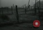 Image of debris in fence during dust bowl Dalhart Texas USA, 1937, second 22 stock footage video 65675032195