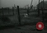 Image of debris in fence during dust bowl Dalhart Texas USA, 1937, second 28 stock footage video 65675032195
