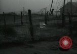 Image of debris in fence during dust bowl Dalhart Texas USA, 1937, second 30 stock footage video 65675032195