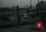 Image of debris in fence during dust bowl Dalhart Texas USA, 1937, second 43 stock footage video 65675032195