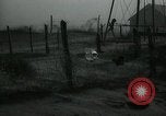 Image of debris in fence during dust bowl Dalhart Texas USA, 1937, second 46 stock footage video 65675032195