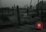 Image of debris in fence during dust bowl Dalhart Texas USA, 1937, second 48 stock footage video 65675032195